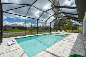 Pool overlooking canal, Outdoor Grilling station - Villa Sand Dollar Siesta